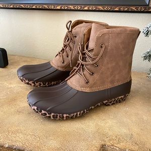 Duck boots brand new with original box.  Brown with Leopard print bottom